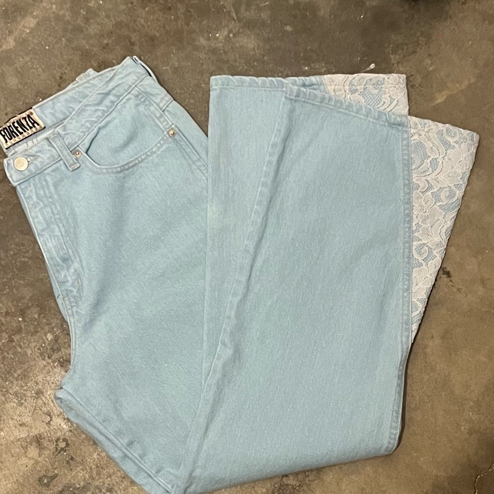 Vintage Firenza Light Blue Jean with lace flaired leg. Excellent condition.